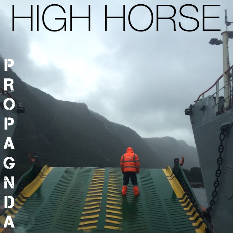 The cover art for the song High Horse by PROPAGNDA, featuring a man in an orange jacket facing away from the viewer and gazing off towards an unknown land in the distance with green-covered mountains, as he stands on the back of a large ferry/ship/vessel under overcast skies. 